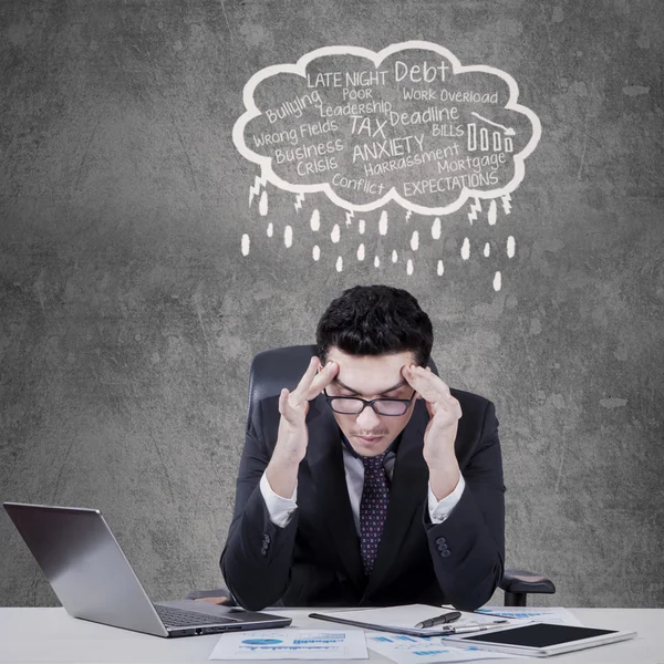 Stressful manager with cloud tag of problems — Stock Photo, Image