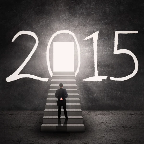 Businessman on doorway of a future — Stock Photo, Image