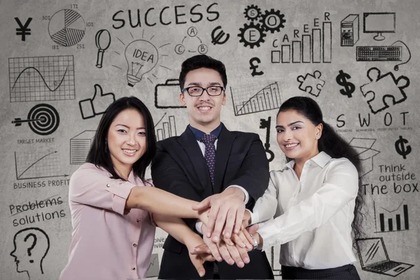 Successful businesspeople joining hands — Stock Photo, Image