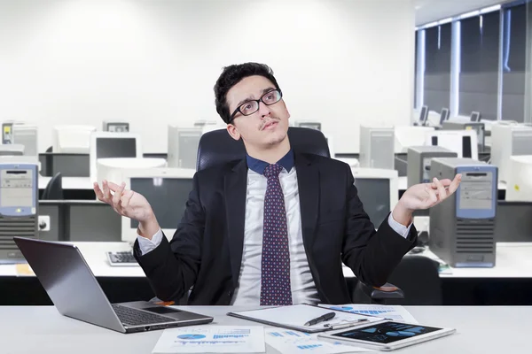 Confused man working at office — Stock Photo, Image