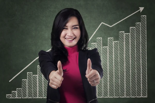 Excited businesswoman showing thumbs up 1 — Stock Photo, Image