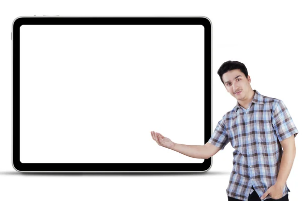 Caucasian man showing empty board — Stock Photo, Image