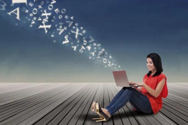 Woman sending information to cloud storage — Stock Photo, Image