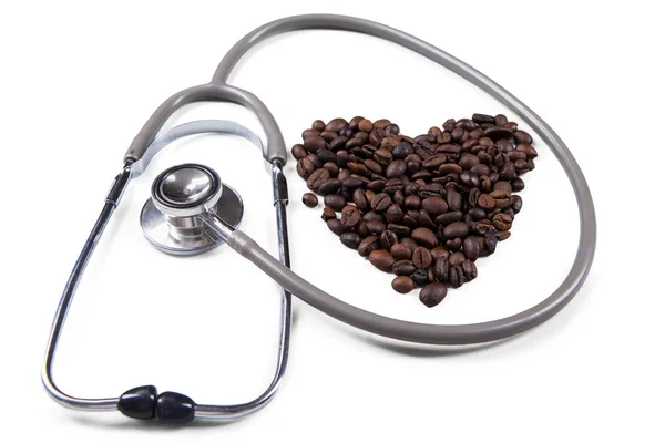 Love symbol with stethoscope and coffee — Stock Photo, Image