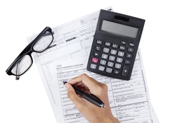 Person filling medical insurance form — Stock Photo, Image