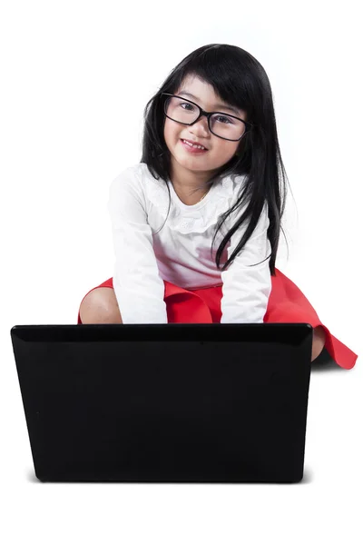 Sweet girl browsing internet with laptop — Stock Photo, Image