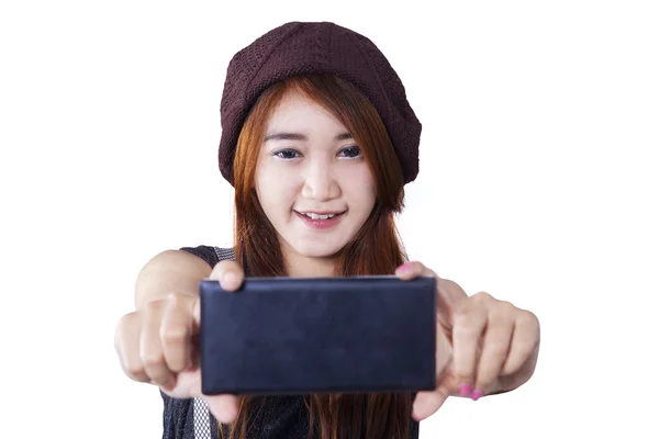 Attractive brunette girl takes a picture — Stock Photo, Image