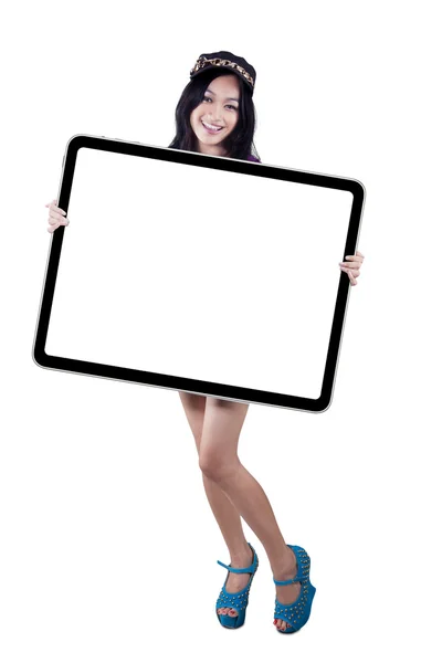 Lovely modern teenage girl with a banner — Stock Photo, Image