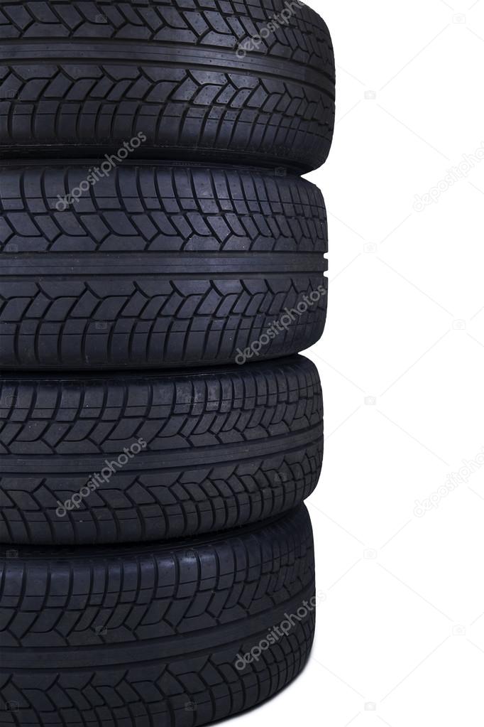 Stack of black tires isolated