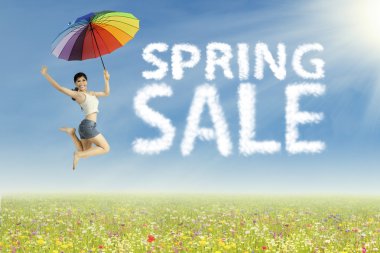 Kadın şemsiye ile atlama