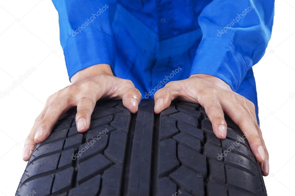 Mechanic hands with textured tire