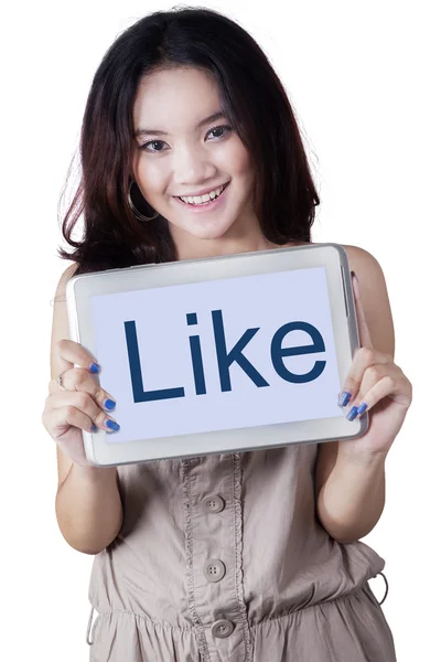 Female student with a text on tablet — Stock Photo, Image