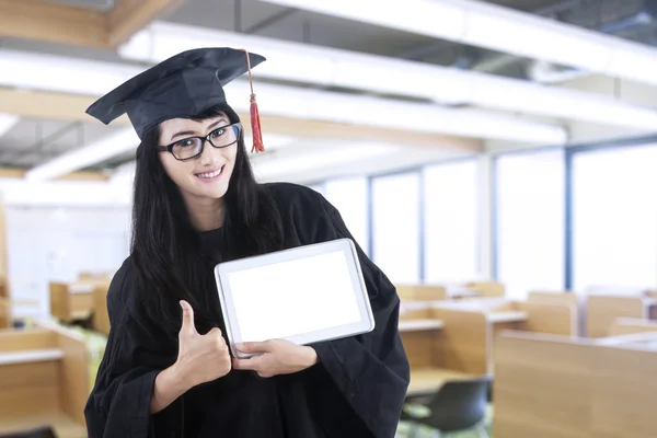 Female bachelor and digital tablet — Stock Photo, Image