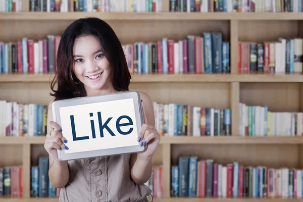 Teenage student with LIKE icon — Stock Photo, Image
