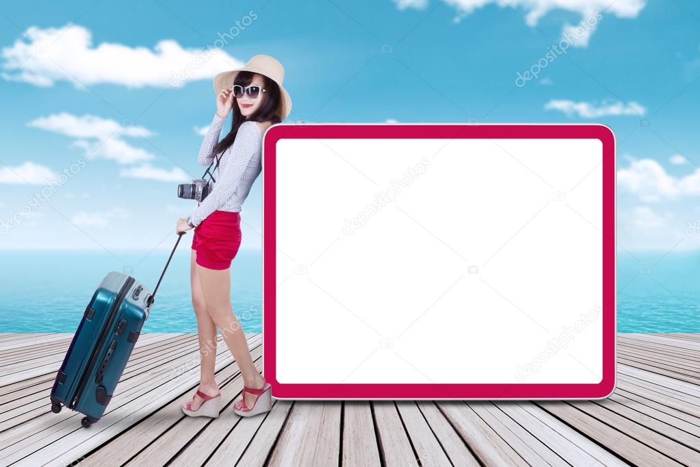 Traveler with billboard at pier