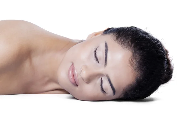 Woman lying down after skincare — Stock Photo, Image