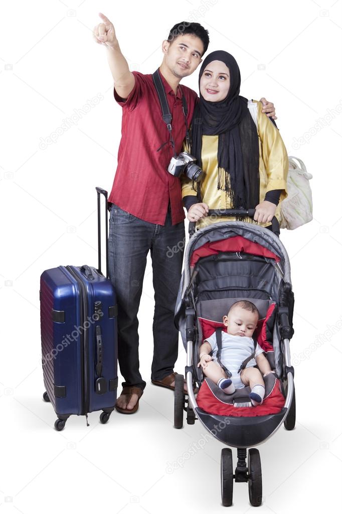 Tourists with a baby stroller