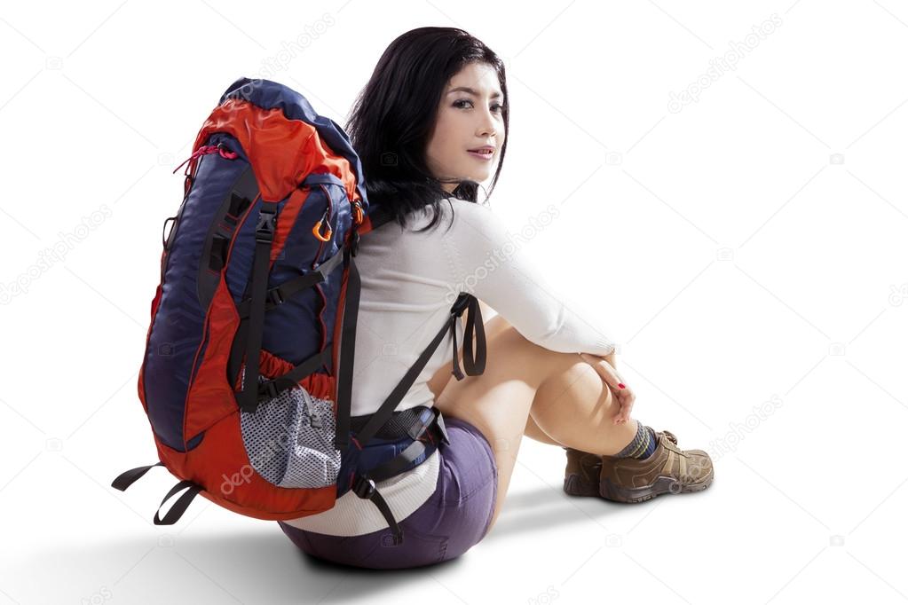 Female hiker sitting in the studio