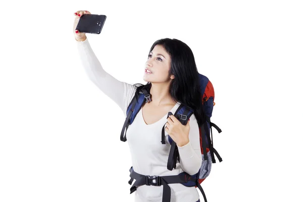 Hiker taking selfie picture in studio — Stock Photo, Image