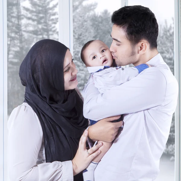 Two parents with their male baby — Stock Photo, Image