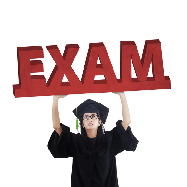Estudante de pós-graduação detém um texto exame — Fotografia de Stock