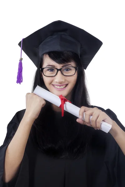 Pretty bachelor holds a diploma in studio — Stock Photo, Image
