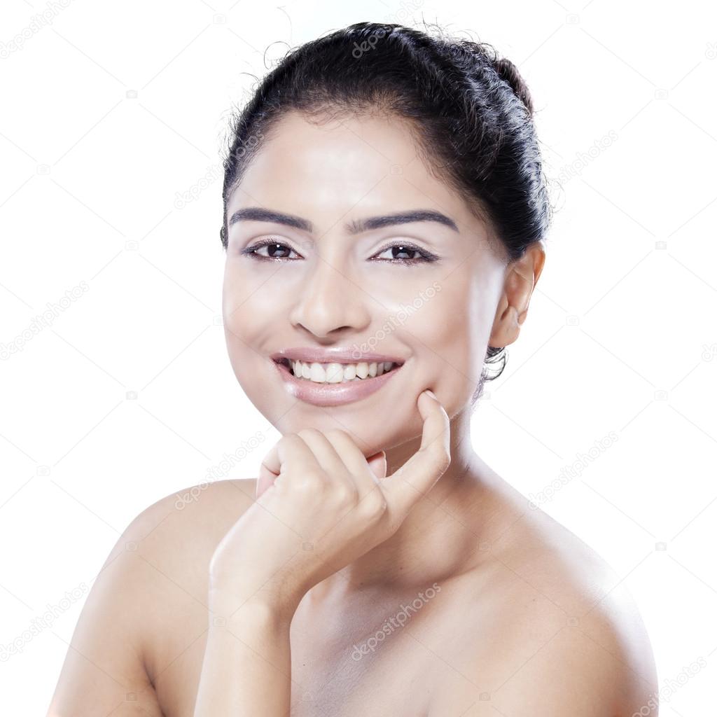 Smiling model with healthy skin face