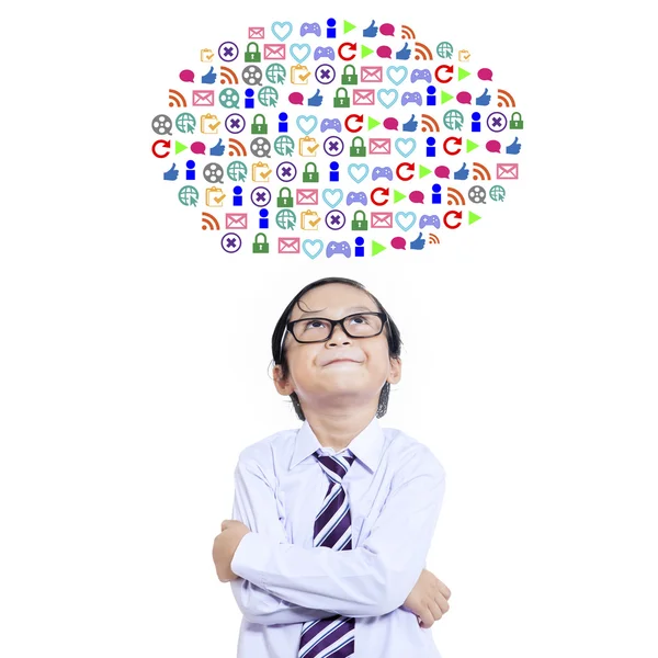 Little child standing under web icons — Stock Photo, Image
