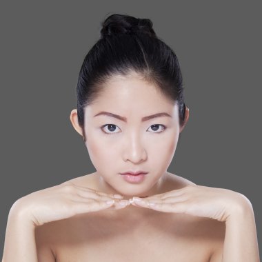 Young chinese woman with beautiful skin