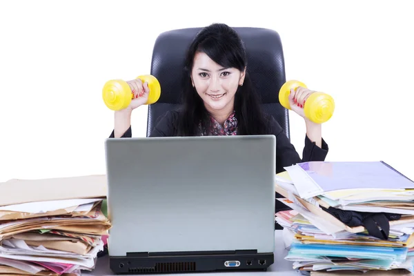 Woman working and workout isolated — Stockfoto