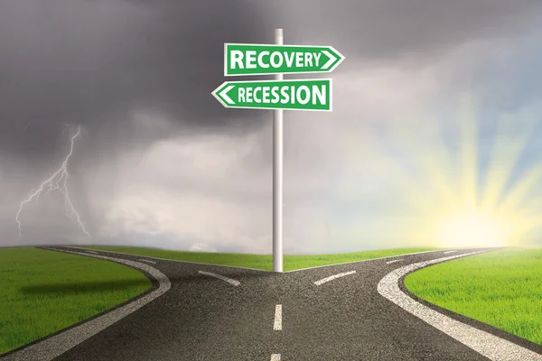 Crisis concept with recession and recovery signpost — 图库照片