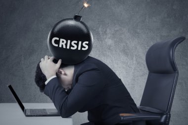 Man with a bomb of economy crisis