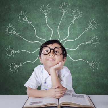 Pensive student with lamps branching