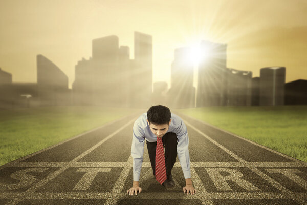 Male worker ready to compete on the track