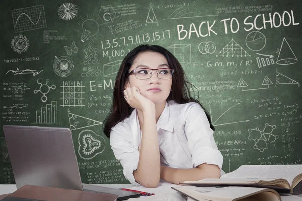 Pensive lovely student in classroom — Zdjęcie stockowe