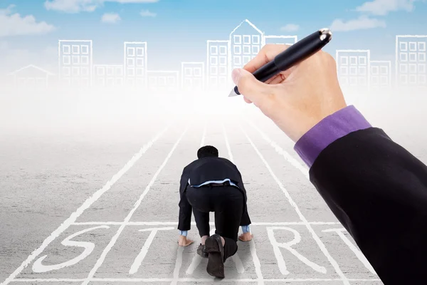 Businessperson on the start line with guide to race — Stock Photo, Image