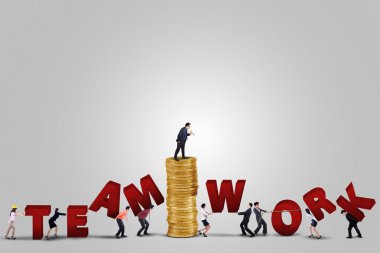 Entrepreneurs arrange a teamwork text