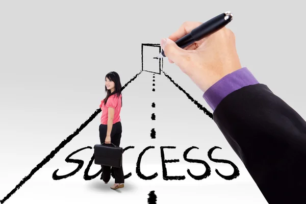 Female worker guided to success door — Stock Photo, Image