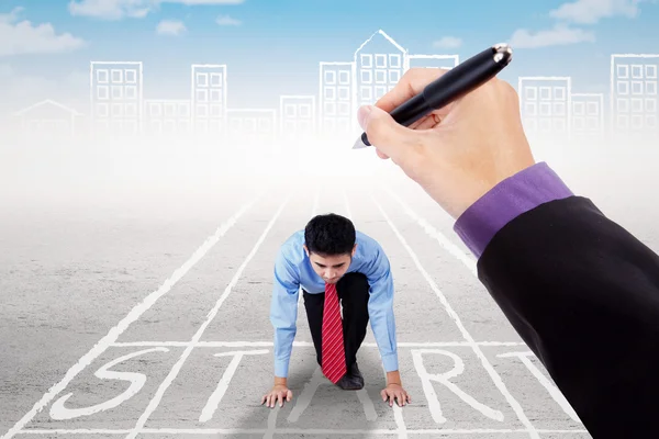 Worker with hand gives a guide to race — Stock Photo, Image