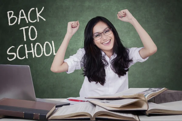 Smart teenage girl celebrate back to school — 图库照片