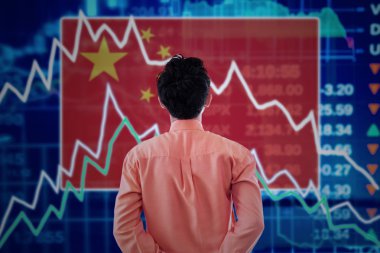 Businessman with a stock market of china