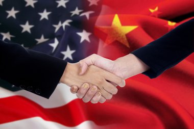 Businesspeople shaking hands after negotiation