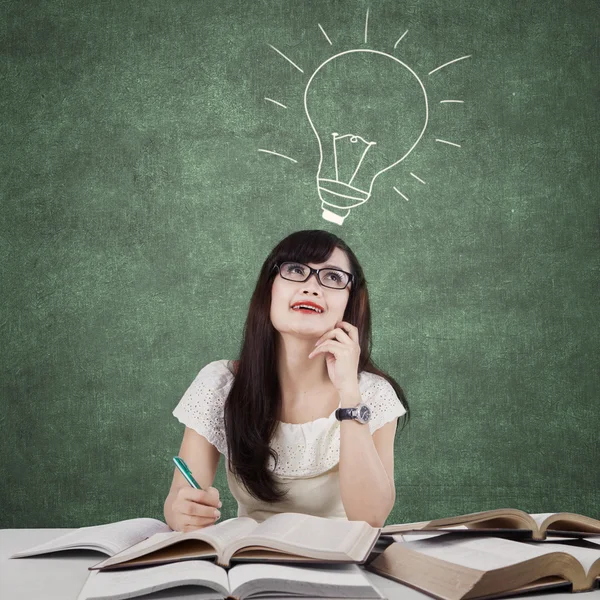 Creative learner studying and thinks idea in class — Stok fotoğraf