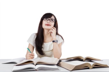 Smart female learner thinking an idea