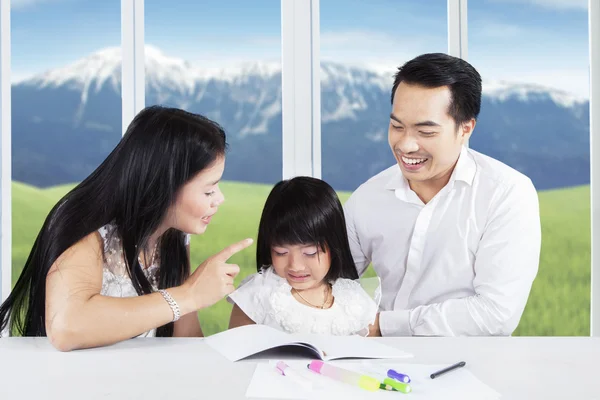 Sad girl scolded by her mother to study — 图库照片