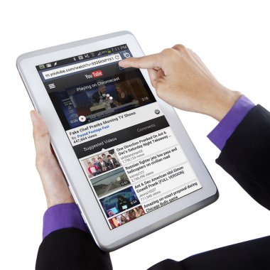 Hands open youtube online with tablet