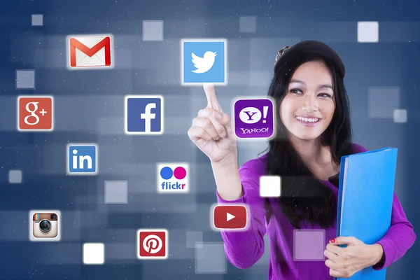 Girl using social media sites on the futuristic screen — 图库照片