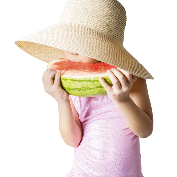 Barn äter vattenmelon i studio — Stockfoto