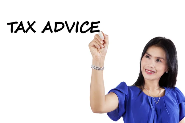 Pretty consultant writes tax advice — Stock Photo, Image
