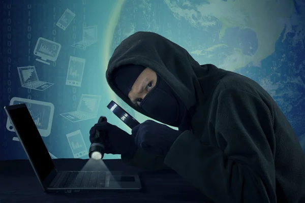 Hacker staring at the camera — Stock Photo, Image